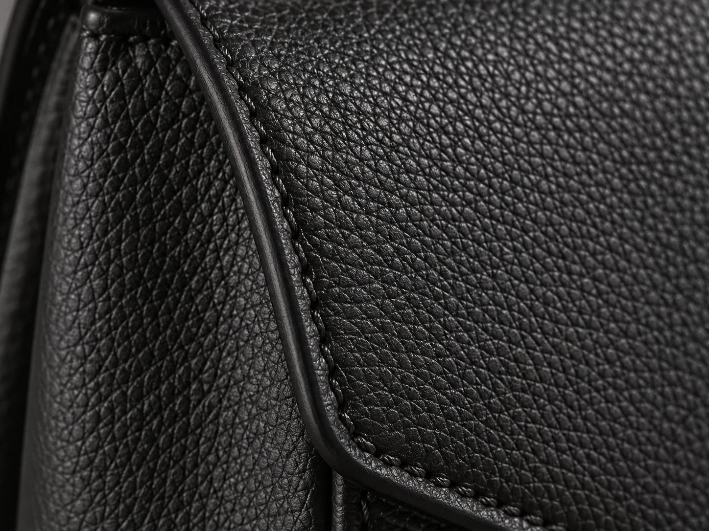 Structured Leather Bag, Black: Surface detail; AI design preview, not verified merchandise evidence