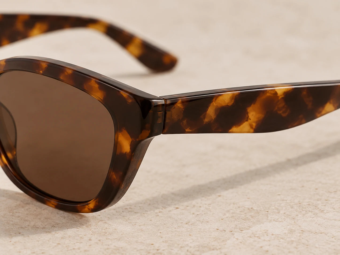 Tortoiseshell Sunglasses, Tortoiseshell: Temple detail; AI design preview, not verified merchandise evidence
