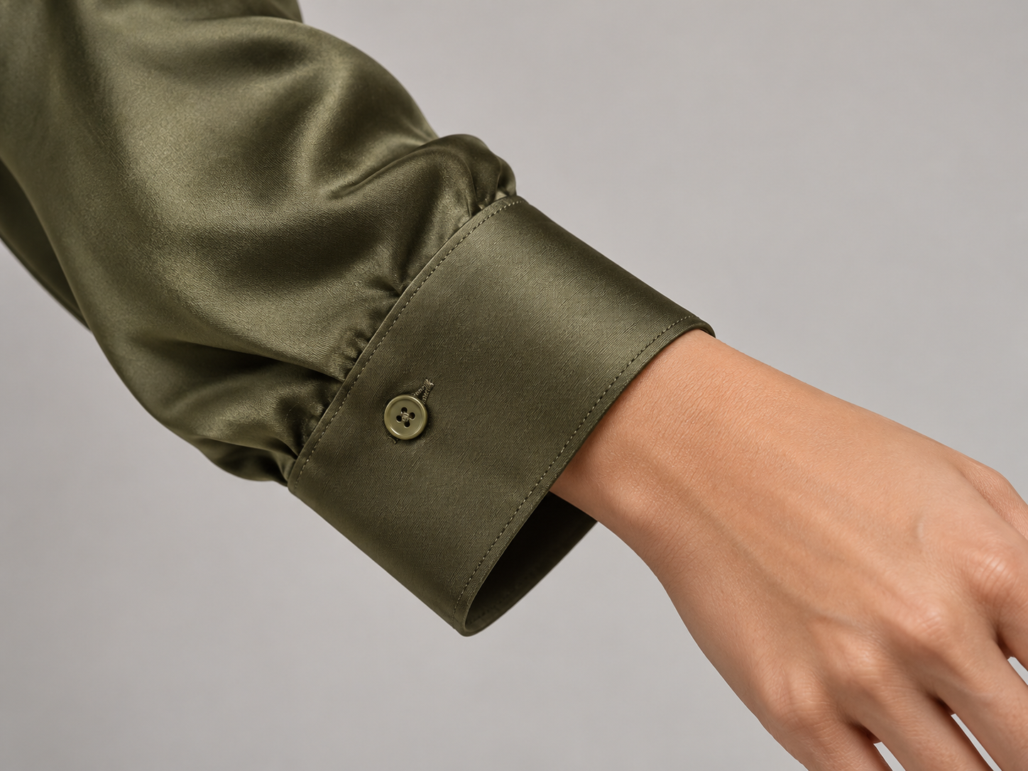Satin Shirt, Olive: Cuff detail; AI-generated design preview, not verified product photography