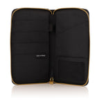 Open family passport holder showing document pockets